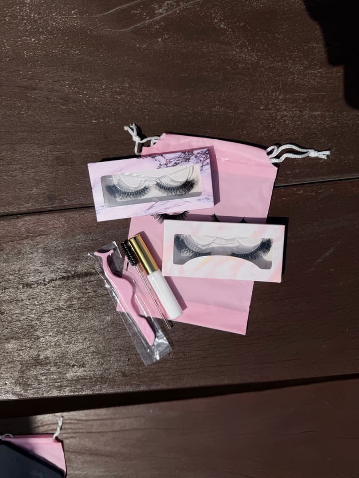 CharmeUp lash kits, pouches and accessories flatlay